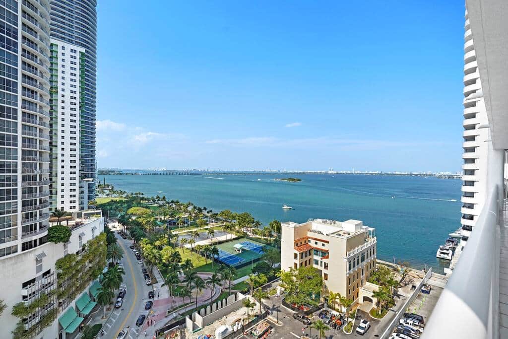 Furnished balcony with views of Biscayne Bay and Margaret Pace Park