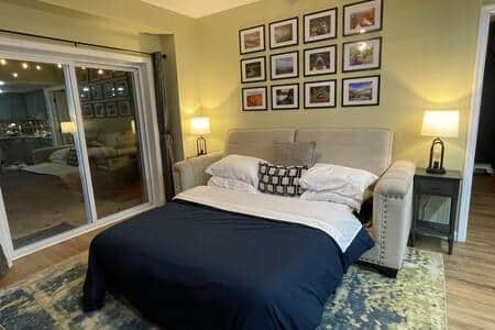 Sofa pulls out to a comfortable queen bed with a gel mattress.  Black-out curtains are in the suite.