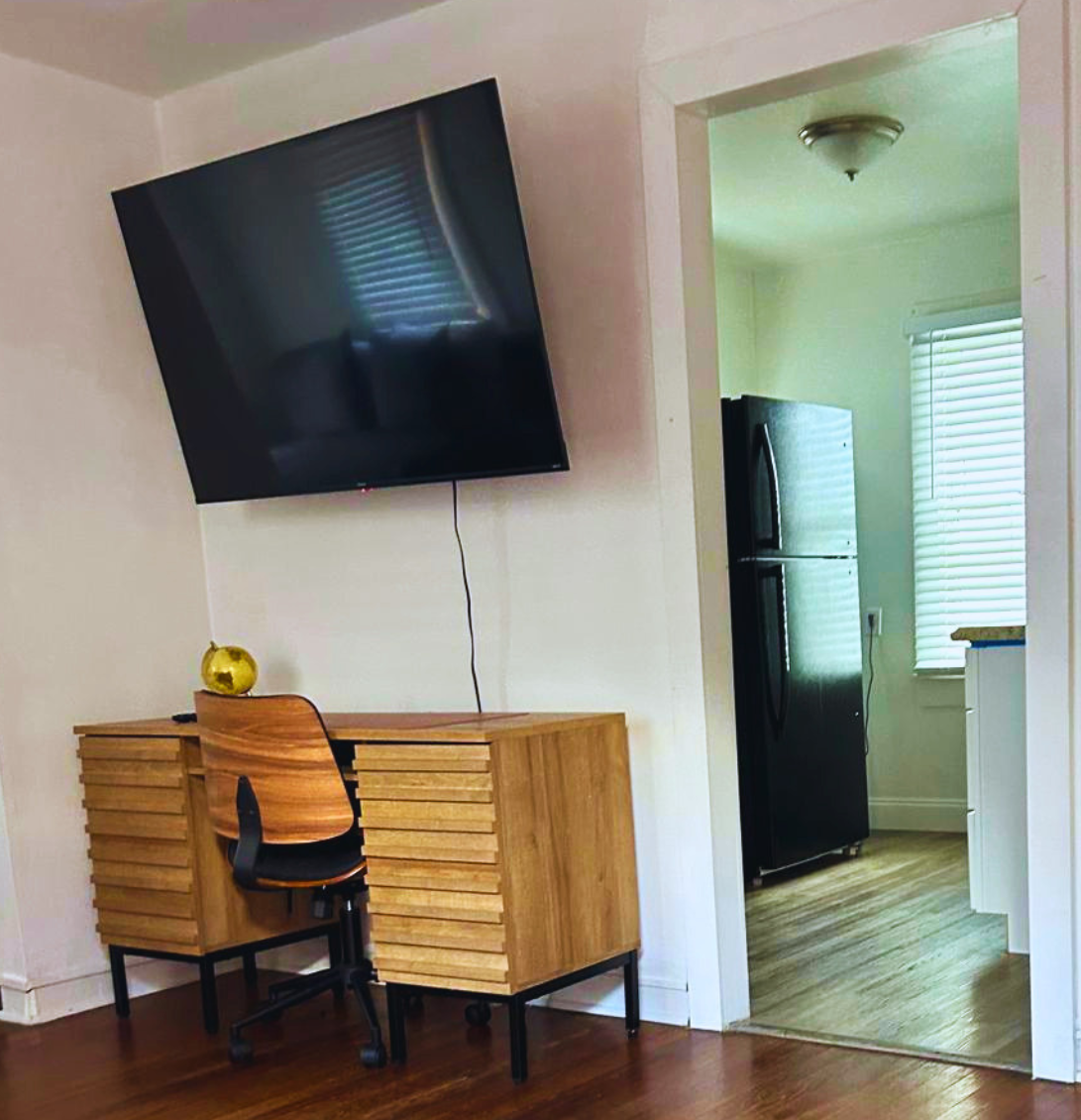 Dedicated workspace with a stylish desk and comfortable chair. Lakeland, FL