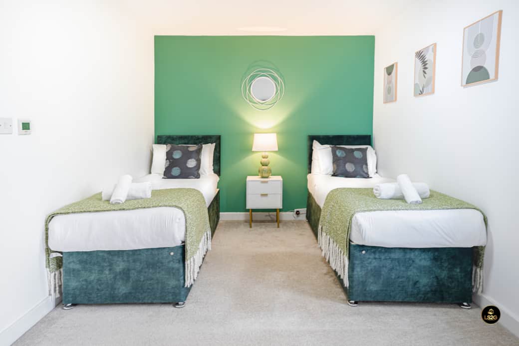 Bedroom 2 with One Link bed (2 Singles or 1 King) and Smart TV Bedroom 2 with One Link bed (2 Singles or 1 King) and Smart TV