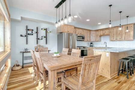 The dining table can seat 6 comfortably. There is additional seating for 4 at the kitchen bar. The dining table can seat 6 comfortably. There is additional seating for 4 at the kitchen bar.