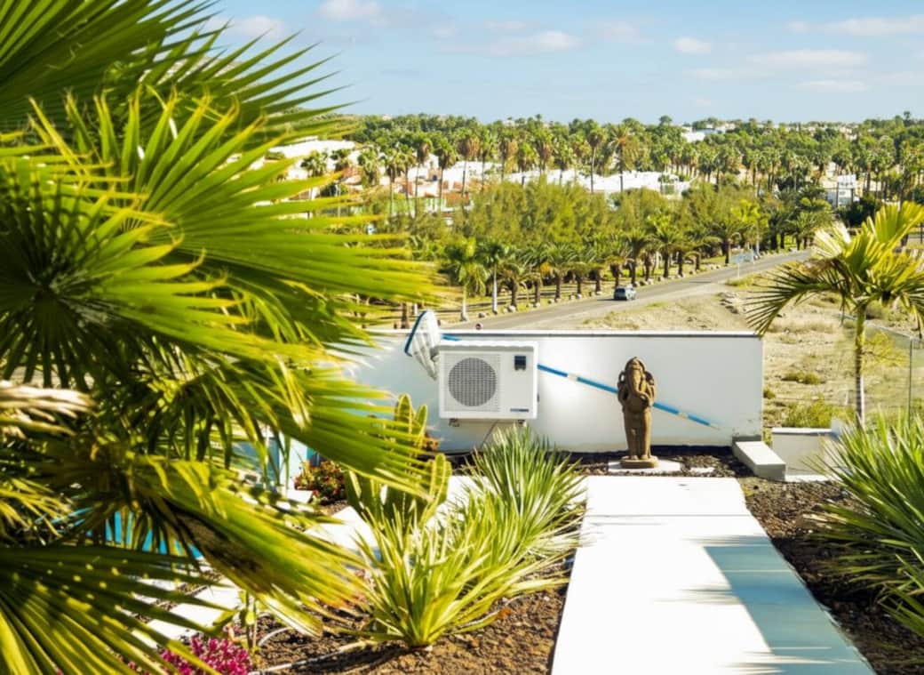 Path down to pool with Maspalomas in background