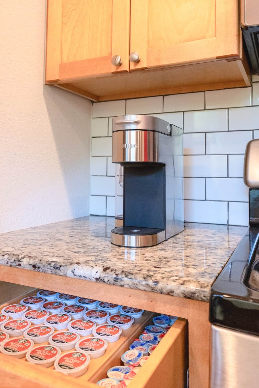 Keurig® K-Supreme Coffee Maker is provided, along with complimentary coffee pods and creamer.