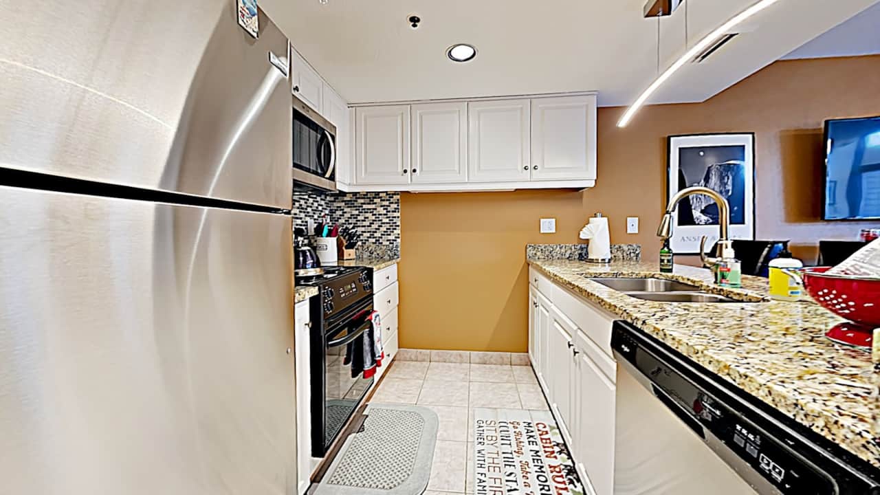 Full Kitchen with dishwasher, refrigerator, stove, oven, microwave, Burr Coffee grinder