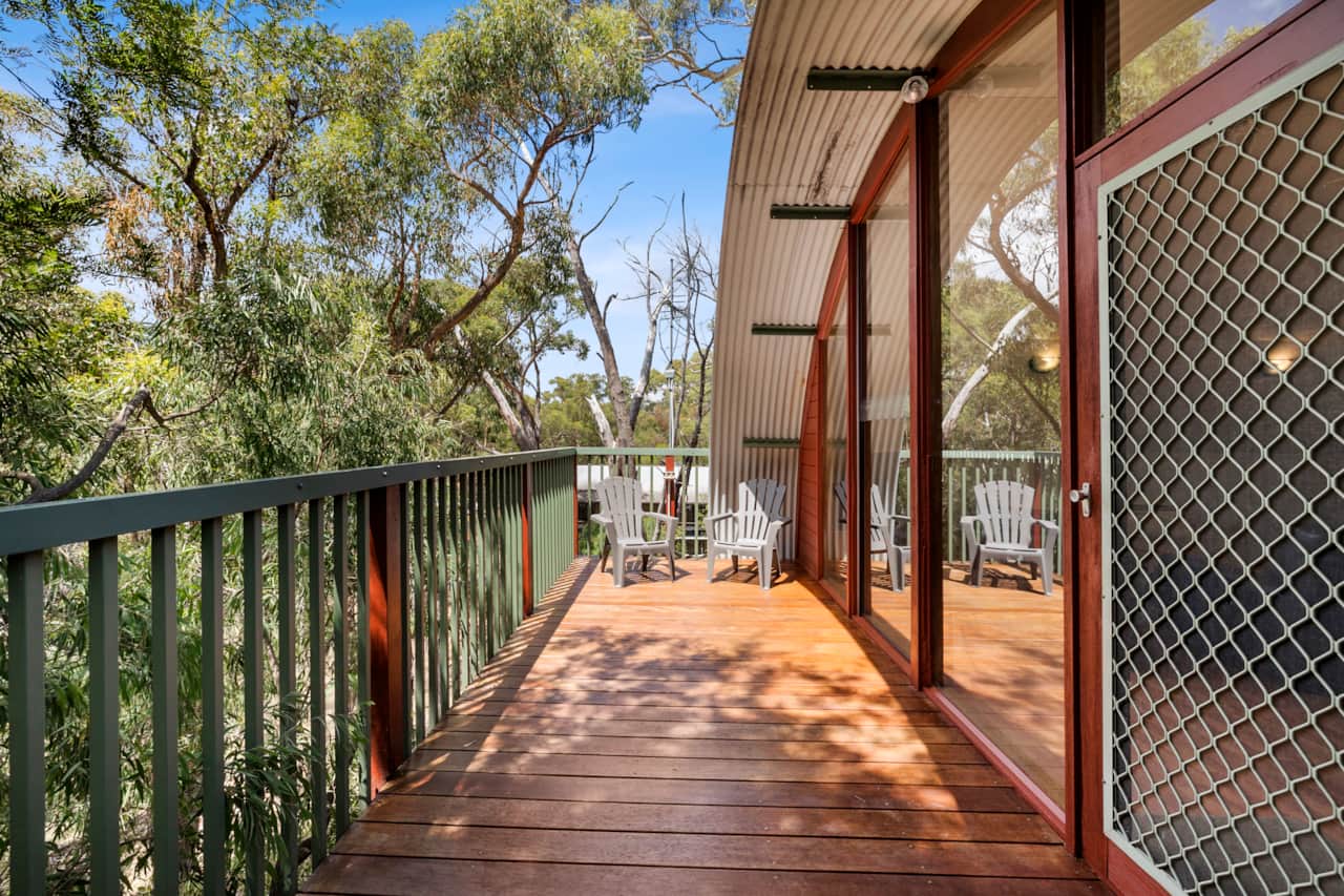 Relax on the balcony with a perfect vantage point for peaceful moments and delightful stays.