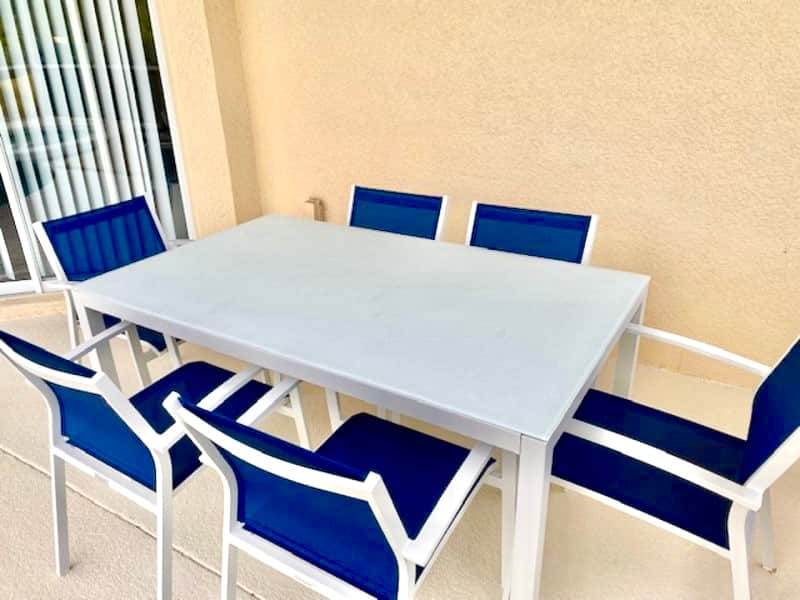 Dining table and chairs for al fresco dining