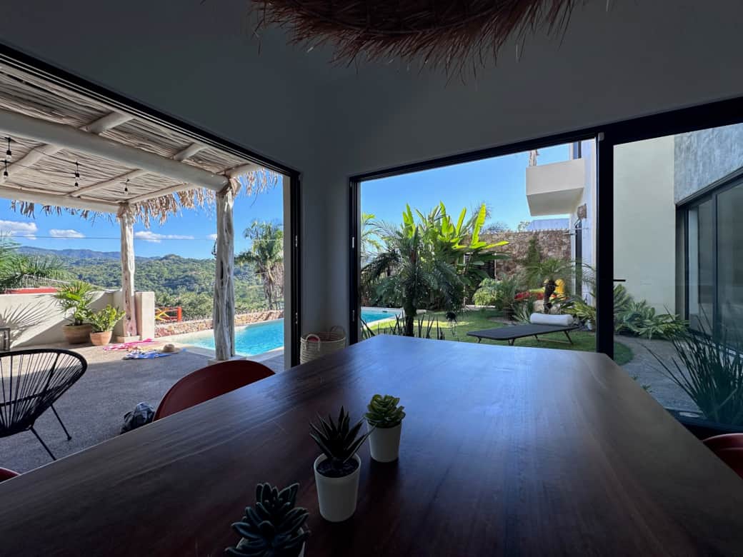 Indoor dining with open doors