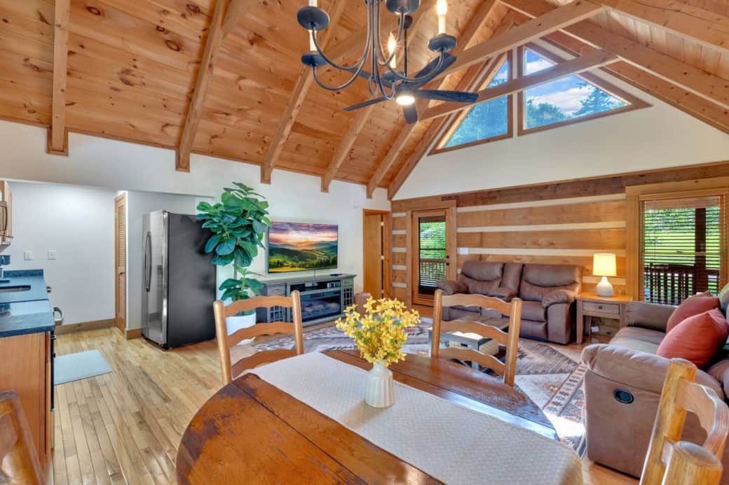 Enjoy meals together at the dining table with seating for four, just off the kitchen and open to the living area—perfect for family dinners, game nights, or planning your next mountain adventure. Enjoy meals together at the dining table with seating for four, just off the kitchen and open to the living area—perfect for family dinners, game nights, or planning your next mountain adventure.