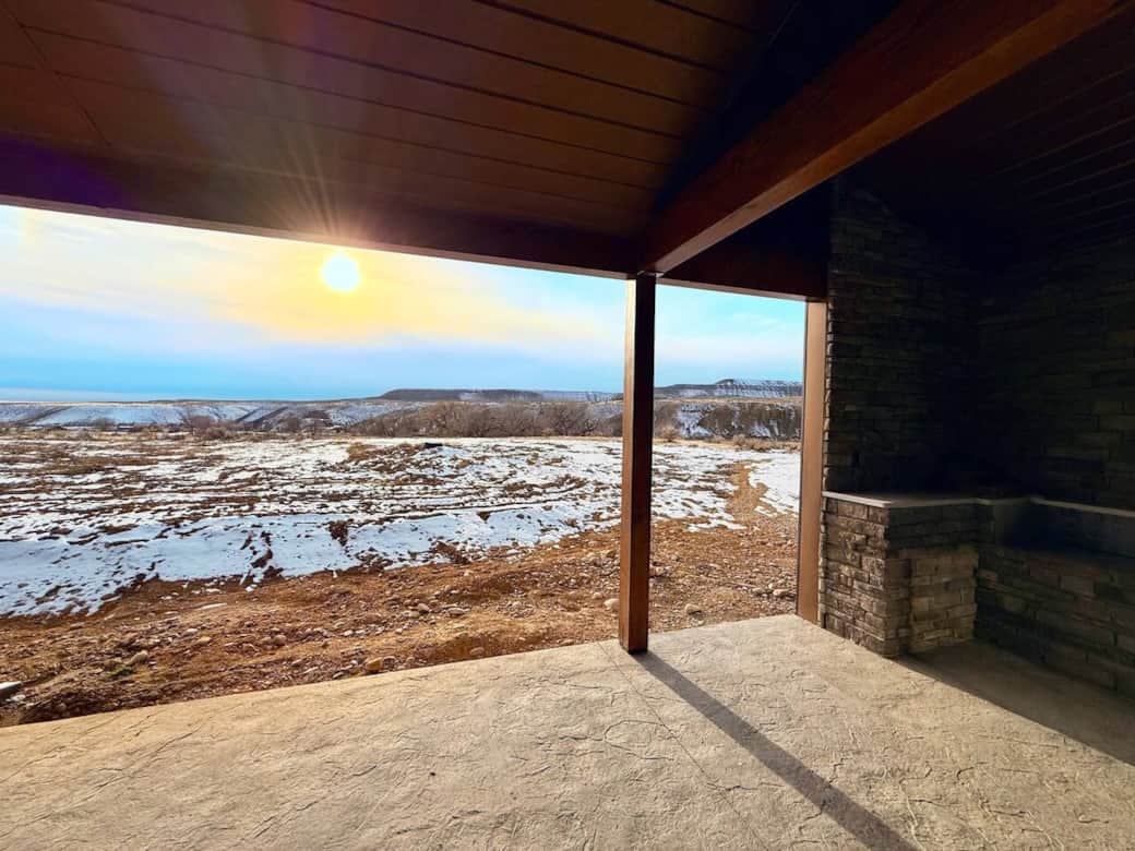 Covered back patio with built in grill and countertop