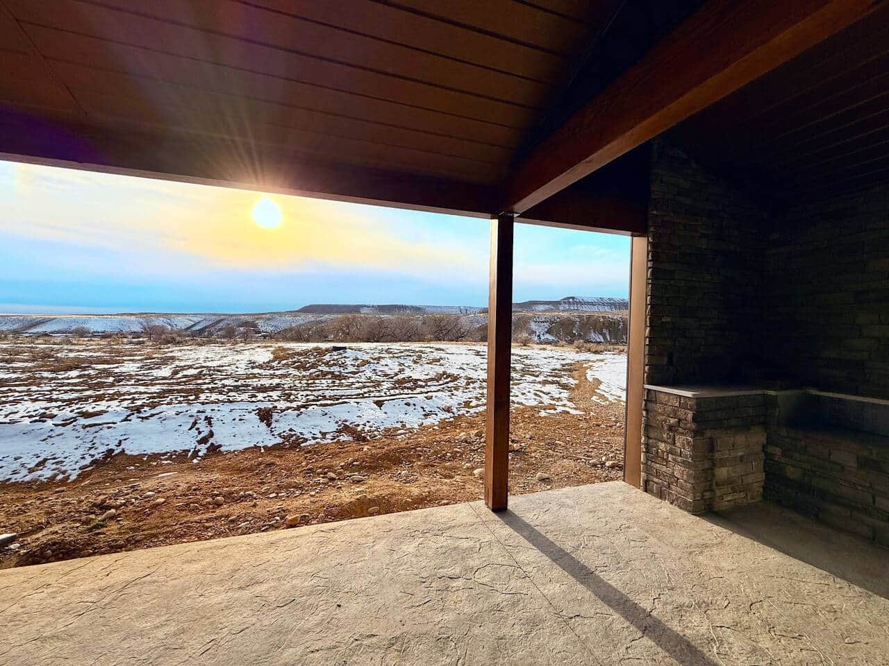 Covered back patio with built in grill and countertop