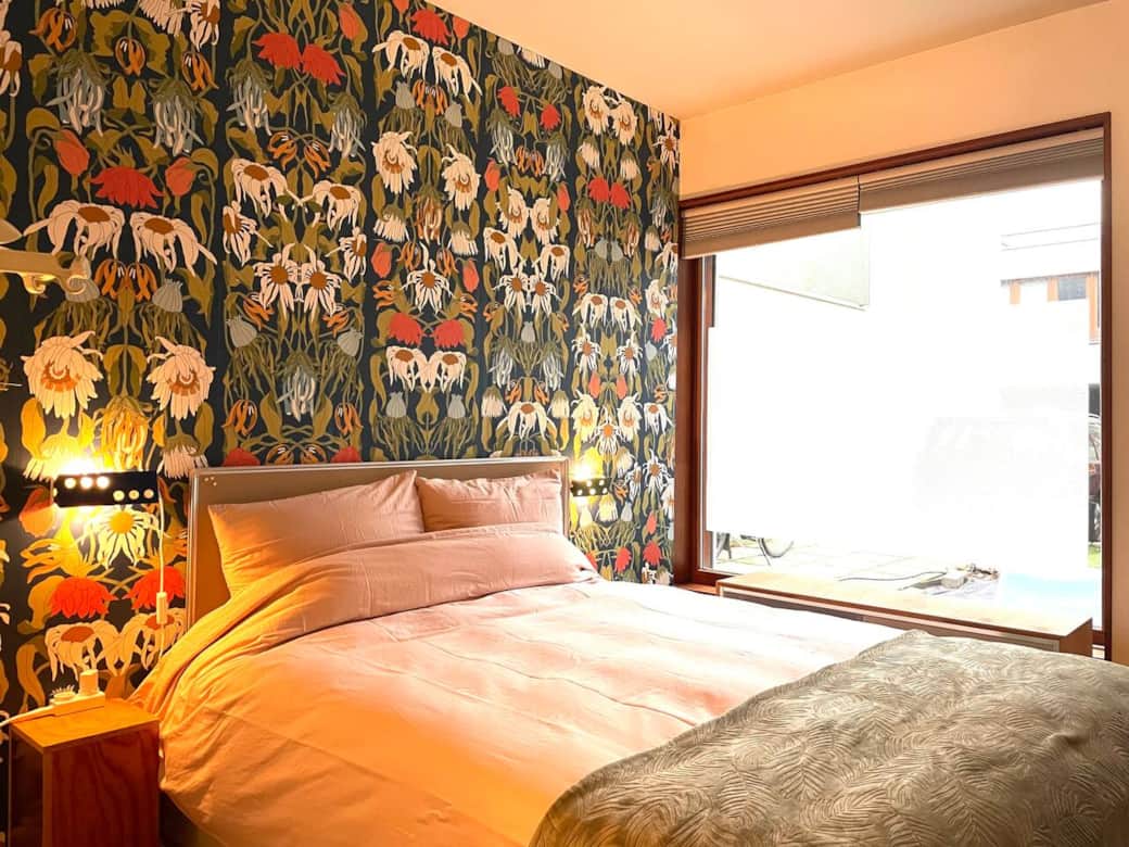 Lovely soft bed covers and Dutch design wall paper!