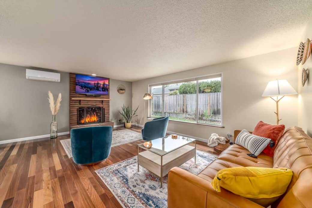 Living room with leather sofa, 360 degree swivel chair and 50 inch 4K Tv. Mitsubishi split AC / Heat Pump. Living room with leather sofa, 360 degree swivel chair and 50 inch 4K Tv. Mitsubishi split AC / Heat Pump.