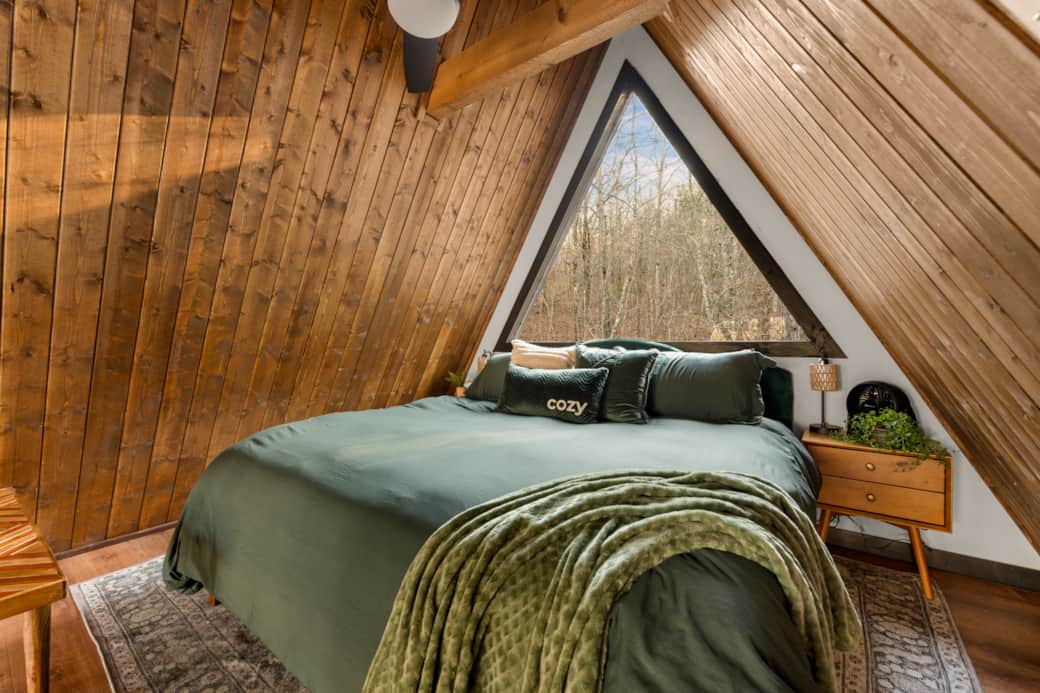 King bed in the open loft 