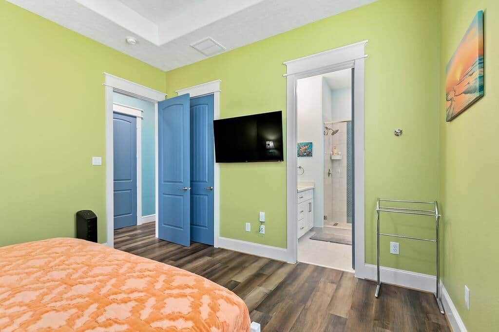 Master Bedroom with roku TV and private bathroom
