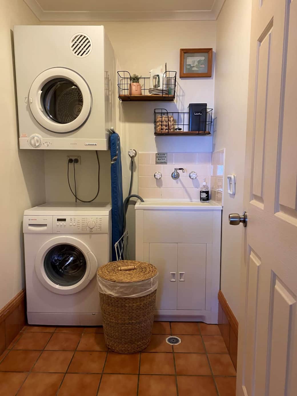 Laundry with washer, dryer, iron etc.