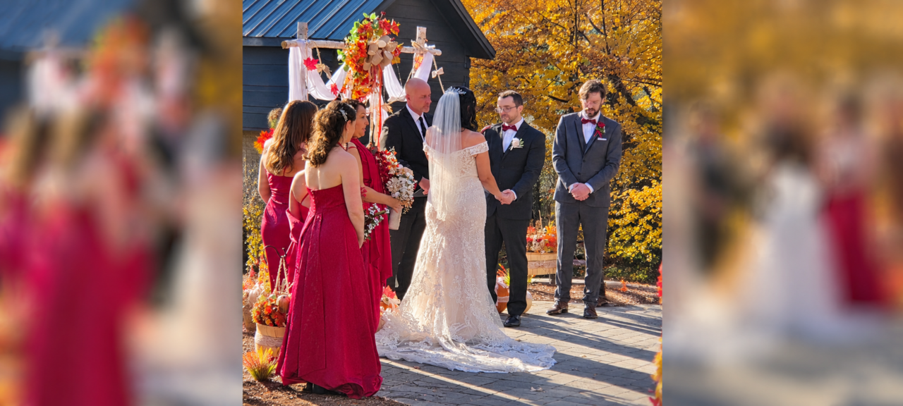 Autumn Wedding Ceremony Under Rustic Arch.png
