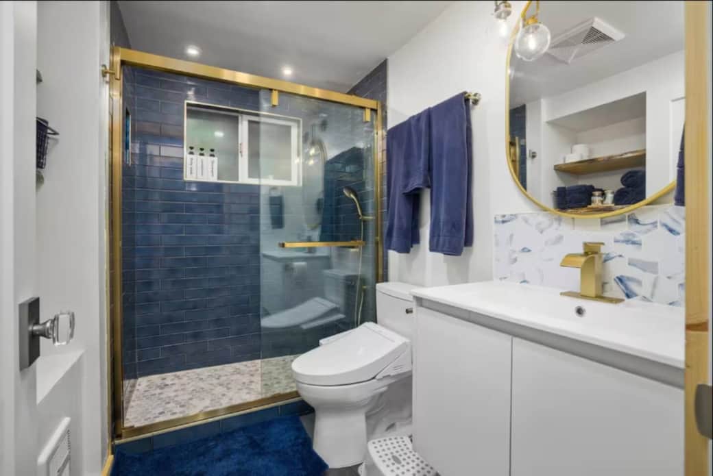 Bright, updated bathroom with walk-in shower and bidet toilet—great for families and longer stays.