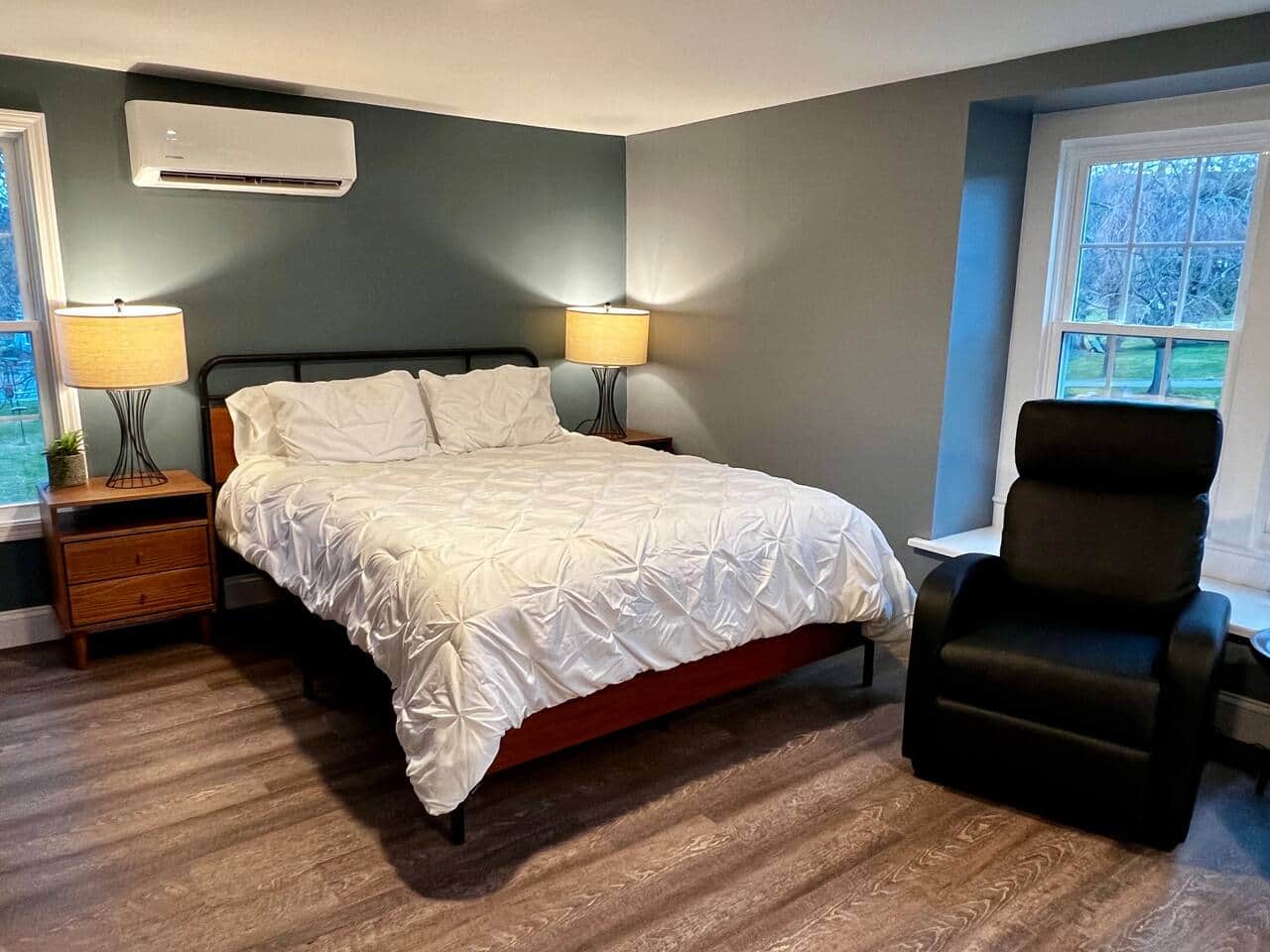 Queen-sized plush bed, end tables with built-in USB plugs and outlets
