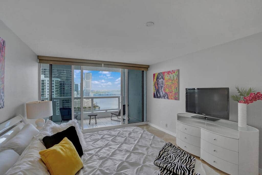 Master Bedroom suite, king bed, balcony access, private bathroom