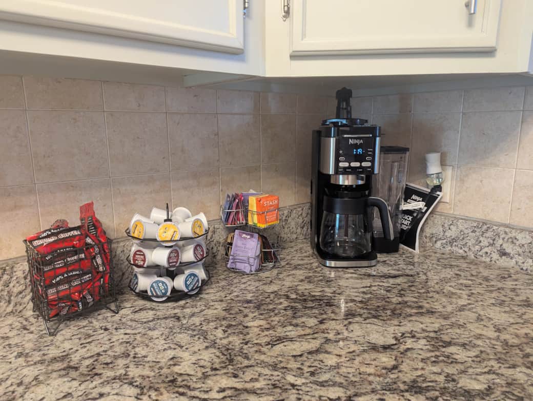 Coffee bar K-cups, brewed coffee, and Hot Tea