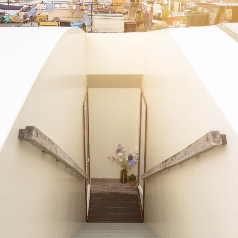 The private outdoor staircase leading to the front door of the boat suite