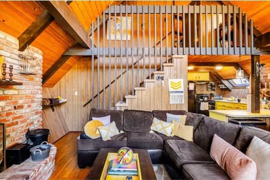 Living room features a plush sectional perfect for napping or staring out the windows. Living room features a plush sectional perfect for napping or staring out the windows.