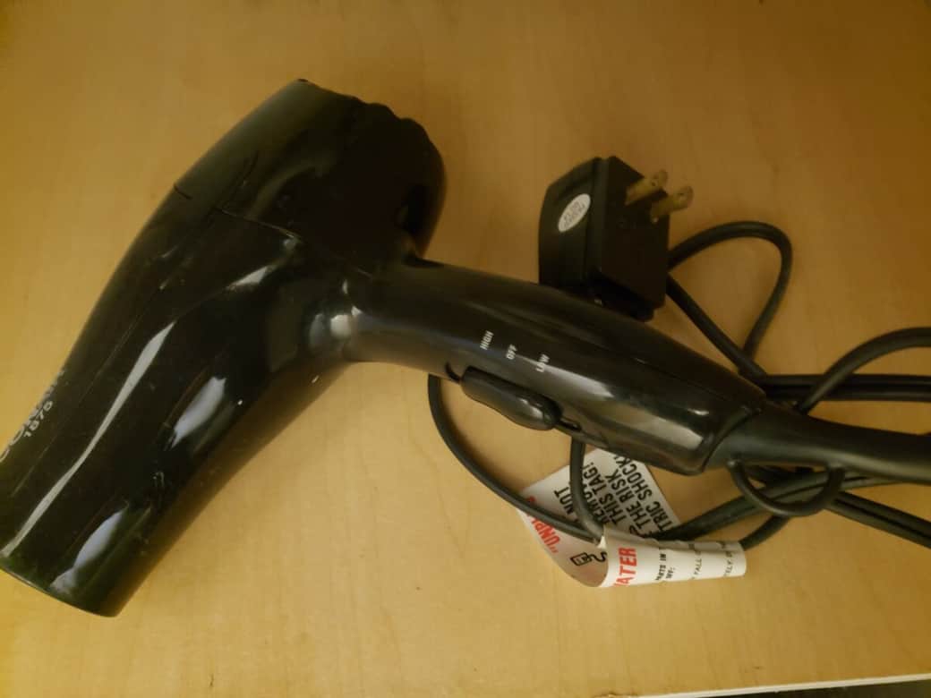 The hairdryer can be found under the sink 