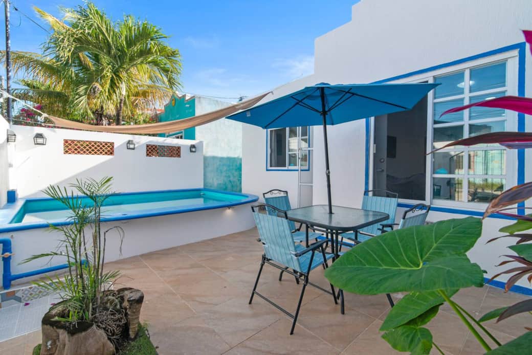 Take a refreshing dip in your private pool and relax on the outdoor furniture—your perfect vacation spot.