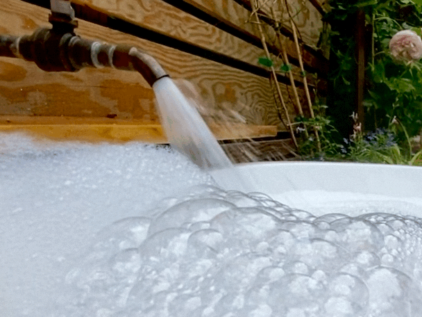 Fresh well water fills the bath