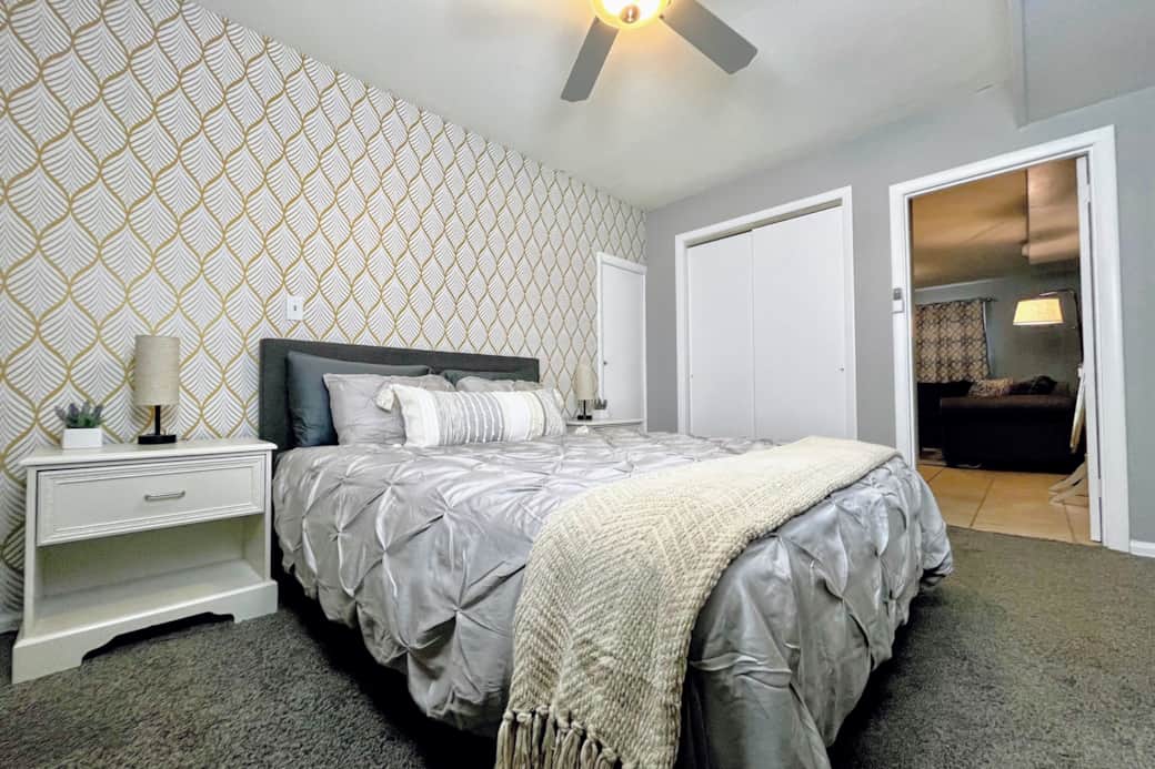 Luxury bamboo linens, side sleeper and back sleeper pillows, touch lamps, darkening curtains