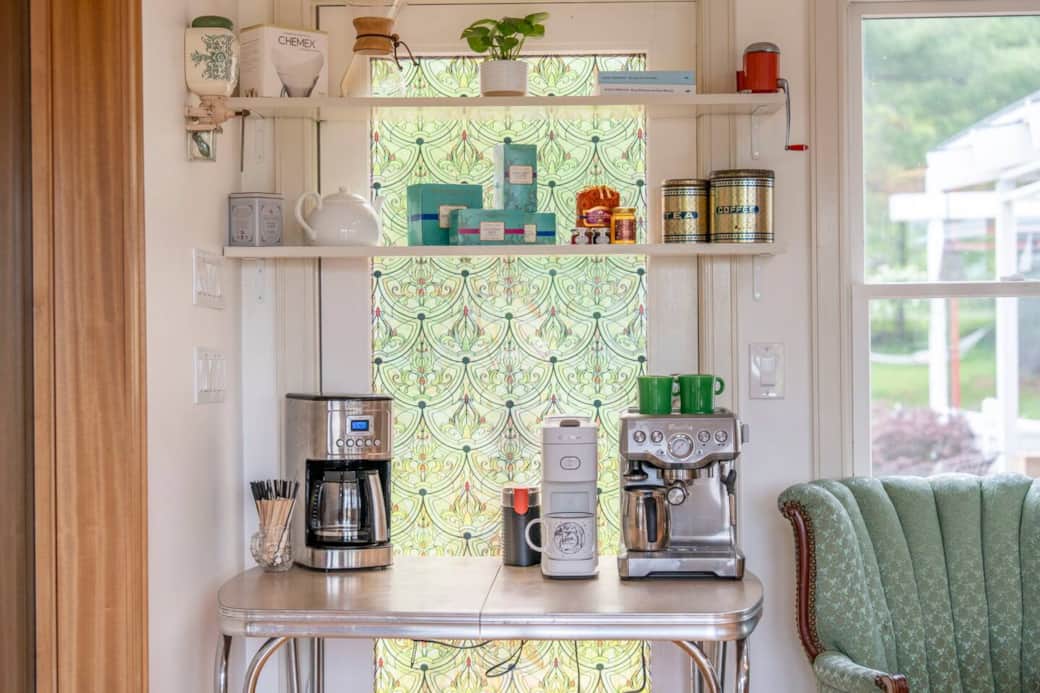Coffee & tea bar with drop, pour-over, single-serve and espresso machine sate the coffee lover.