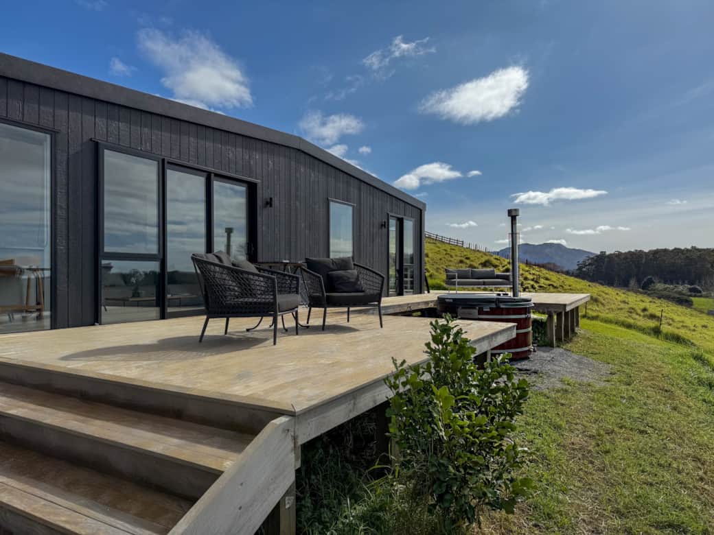 Your serene getaway: farm views and a firewood hot tub under the stars.