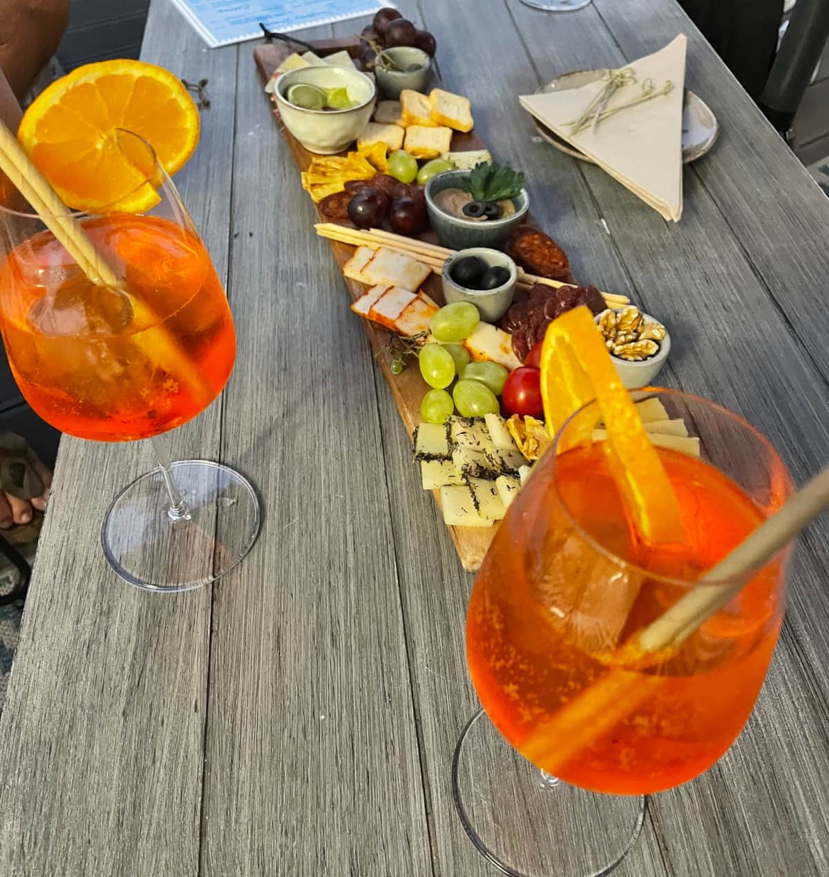 Drinks on the water, with the Marbella skyline in the background
