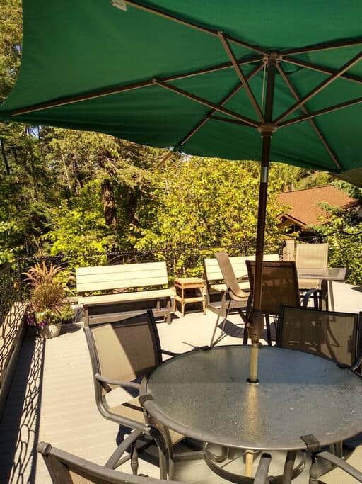 Another view of the rooftop deck. An umbrella is provided for those hot summer days. Another view of the rooftop deck. An umbrella is provided for those hot summer days.