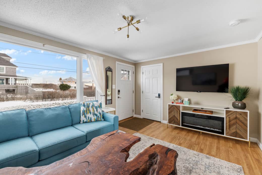 The home has multiple spaces for friends and family to relax and converse.