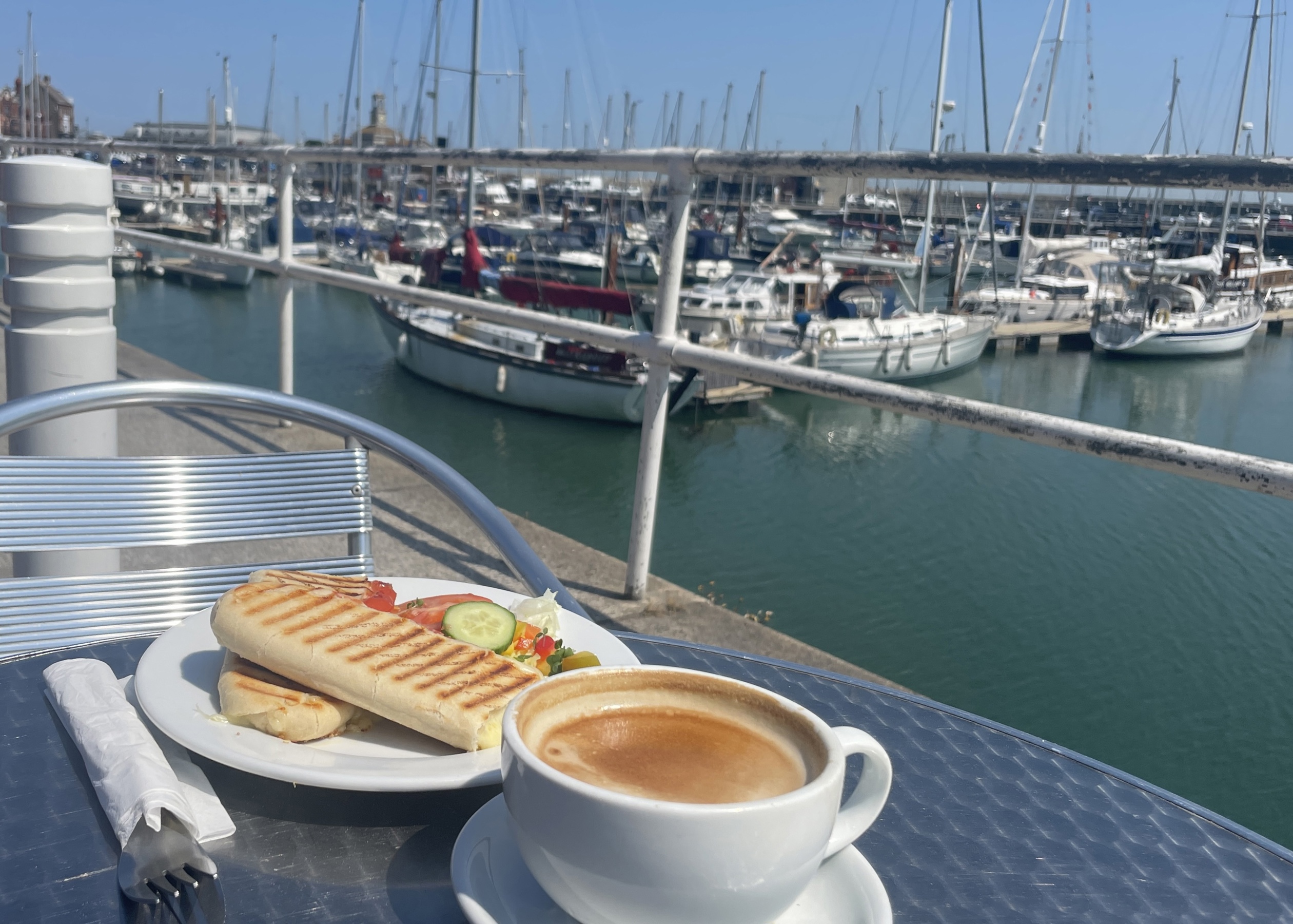 Panini and Coffee by a marina