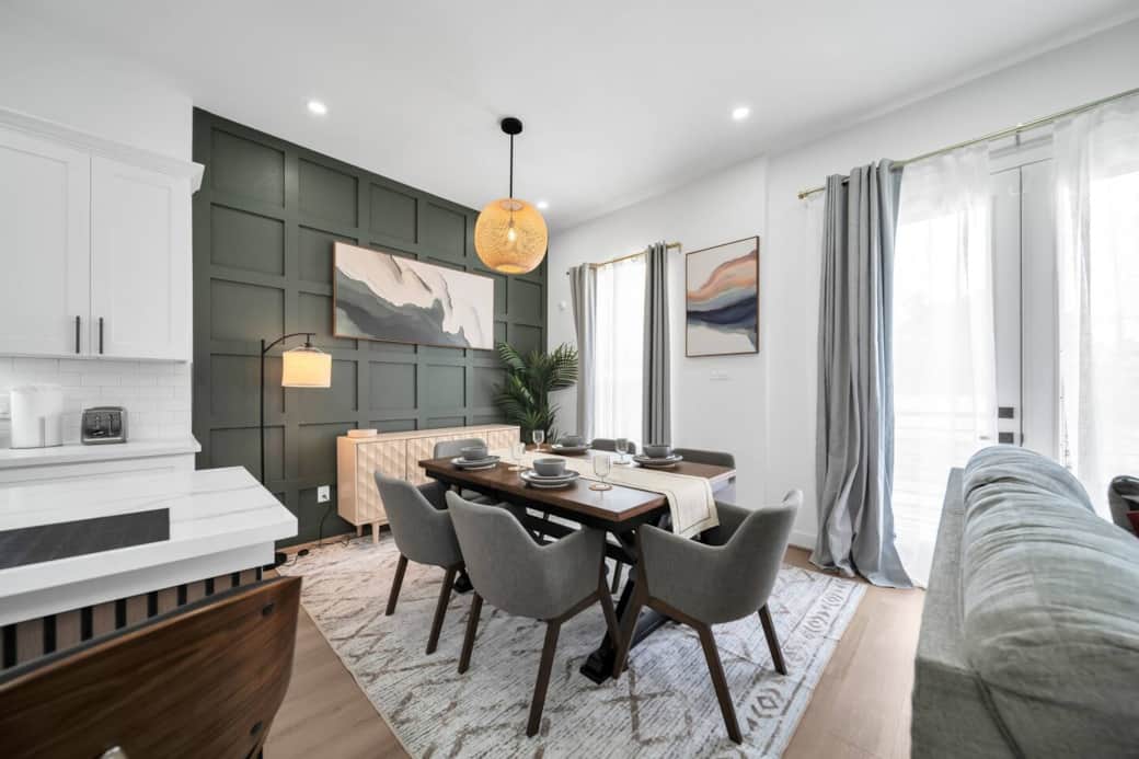 Create cherished memories around this elegant and comfortable dining area, thoughtfully designed for families to connect over meals. The spacious table seats six, perfect for family dinners, holiday celebrations, or board game nights. Create cherished memories around this elegant and comfortable dining area, thoughtfully designed for families to connect over meals. The spacious table seats six, perfect for family dinners, holiday celebrations, or board game nights.