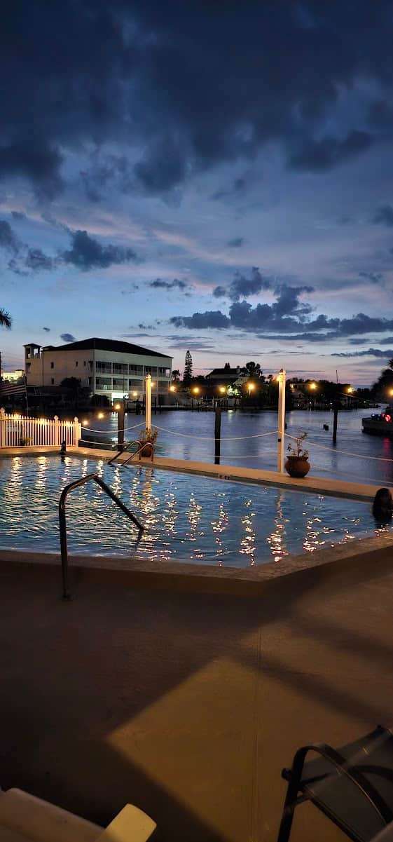 Relax in a bright second-floor condo overlooking the canal — just a short walk to the Gulf. Relax in a bright second-floor condo overlooking the canal — just a short walk to the Gulf.