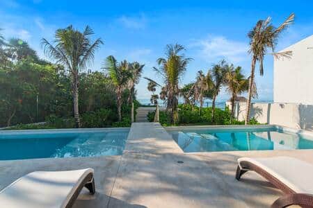 Discover paradise at our beach club with pools, umbrellas & beach access.