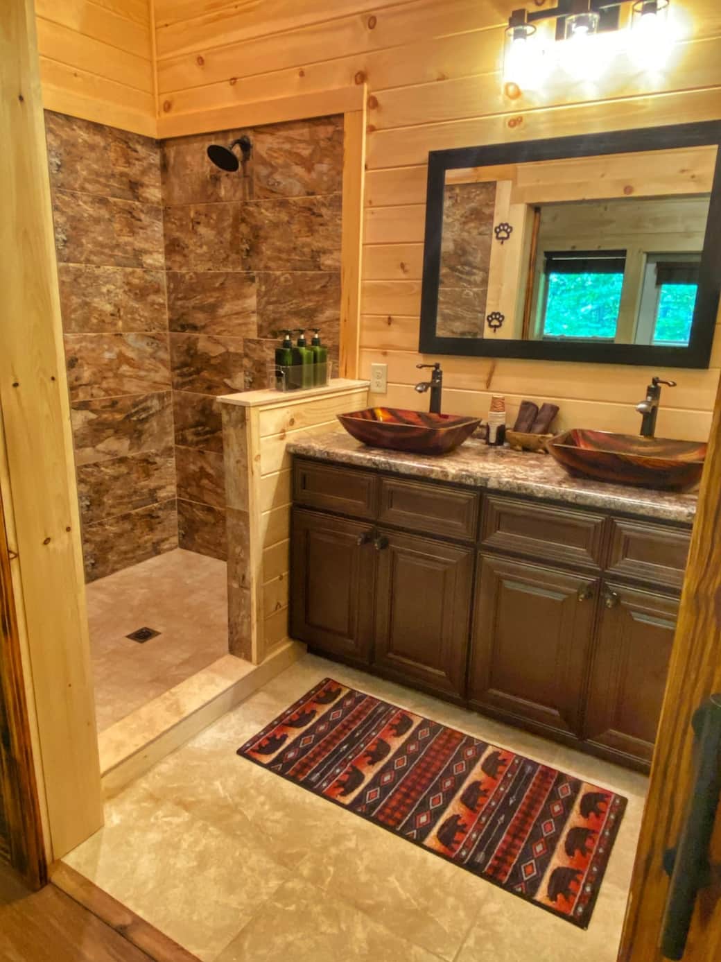 bathroom with two sinks and large walk-in tile shower. Separate toilet area with a curtain for privacy. We provide shampoo, conditioner, & body wash, toilet paper,(2) two towel sets for each person, an extra set for longer stays. Iron and blow dryer. bathroom with two sinks and large walk-in tile shower. Separate toilet area with a curtain for privacy. We provide shampoo, conditioner, & body wash, toilet paper,(2) two towel sets for each person, an extra set for longer stays. Iron and blow dryer.