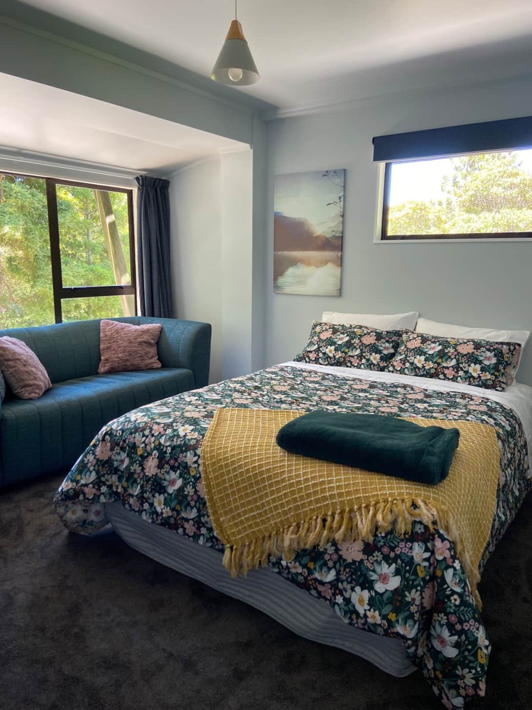Queen bedroom with garden views and natural light