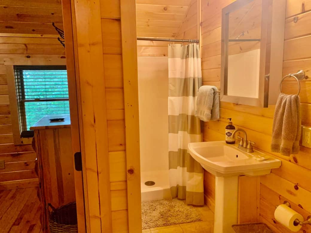 Bathroom connected to bedroom and kitchen