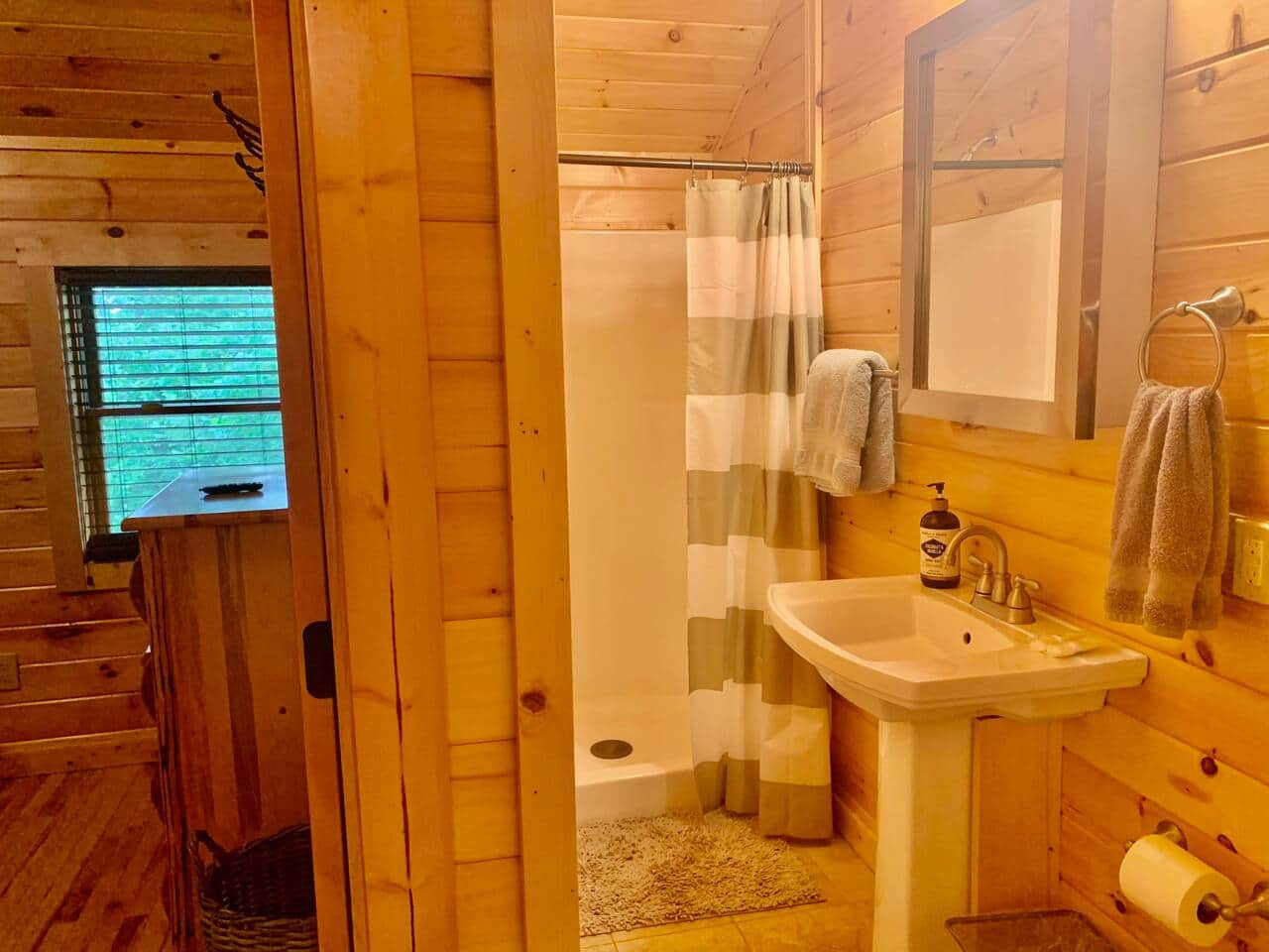 Bathroom connected to bedroom and kitchen