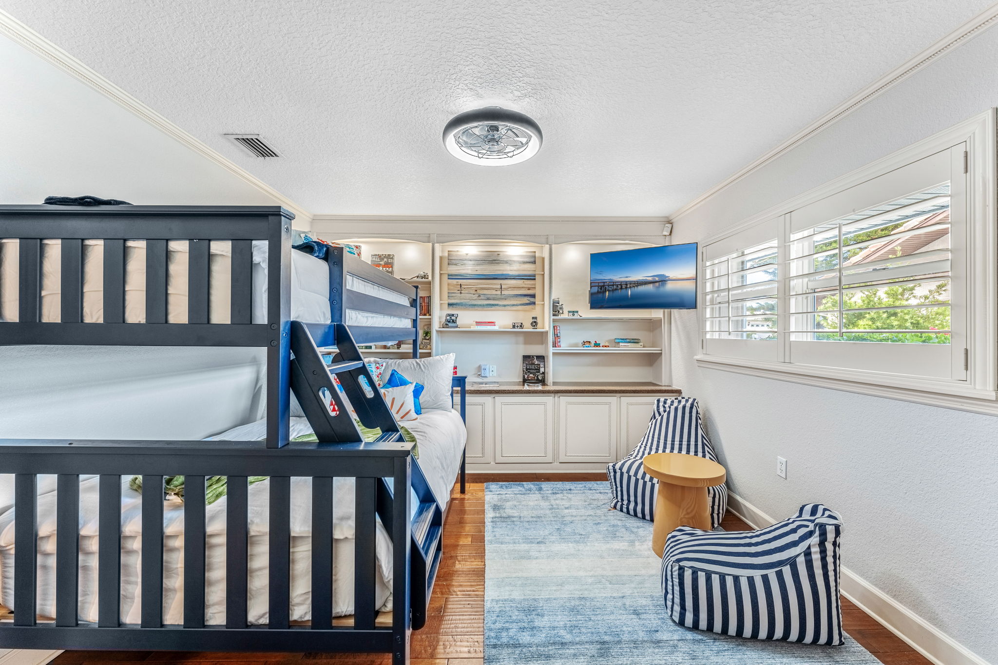 Perfect for the little ones, this playful bedroom with cozy bunks offers a fun and comfortable stay.