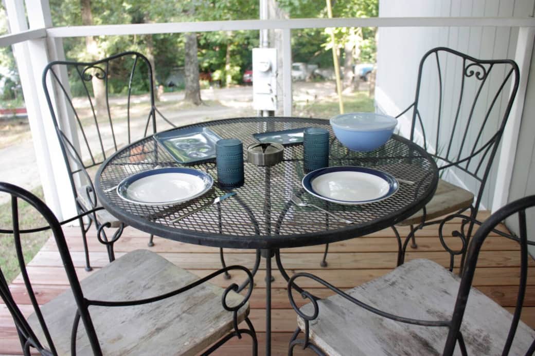 Outdoor dining on the front deck. Seating for four.