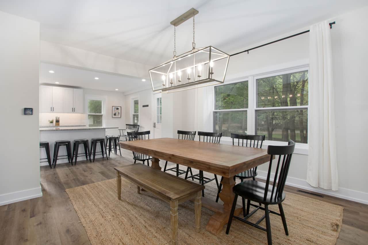 Large dining table and island seating area.