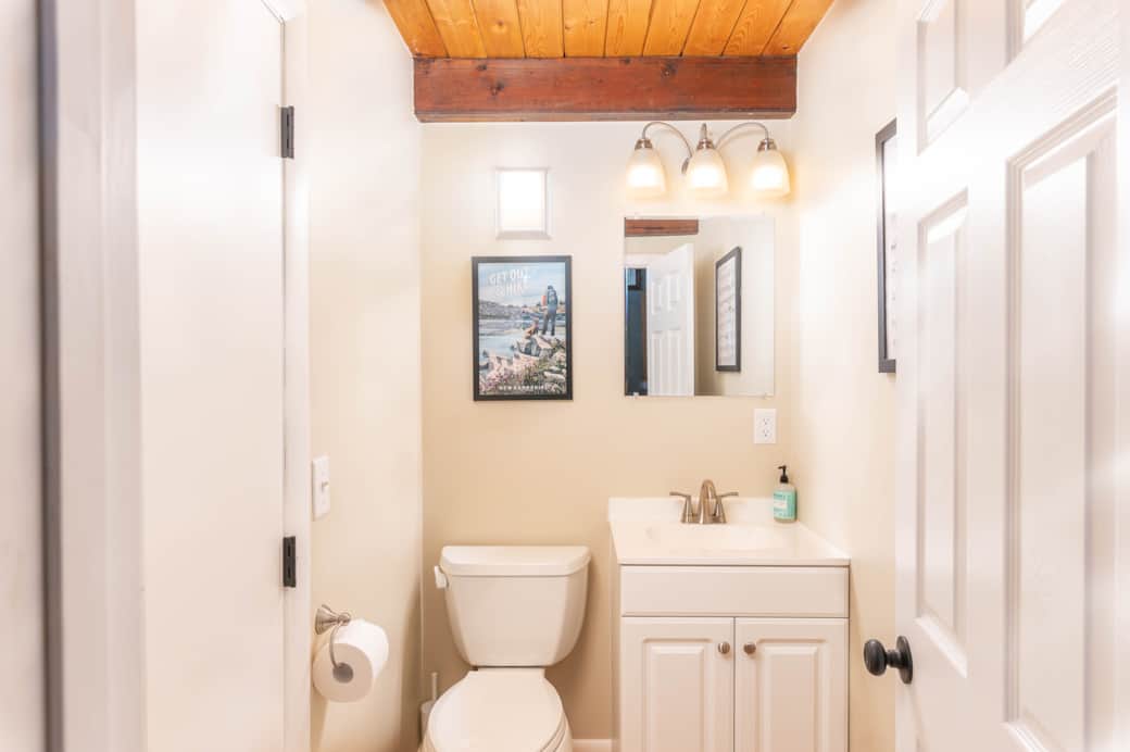 A half bath is located off the entryway landing.