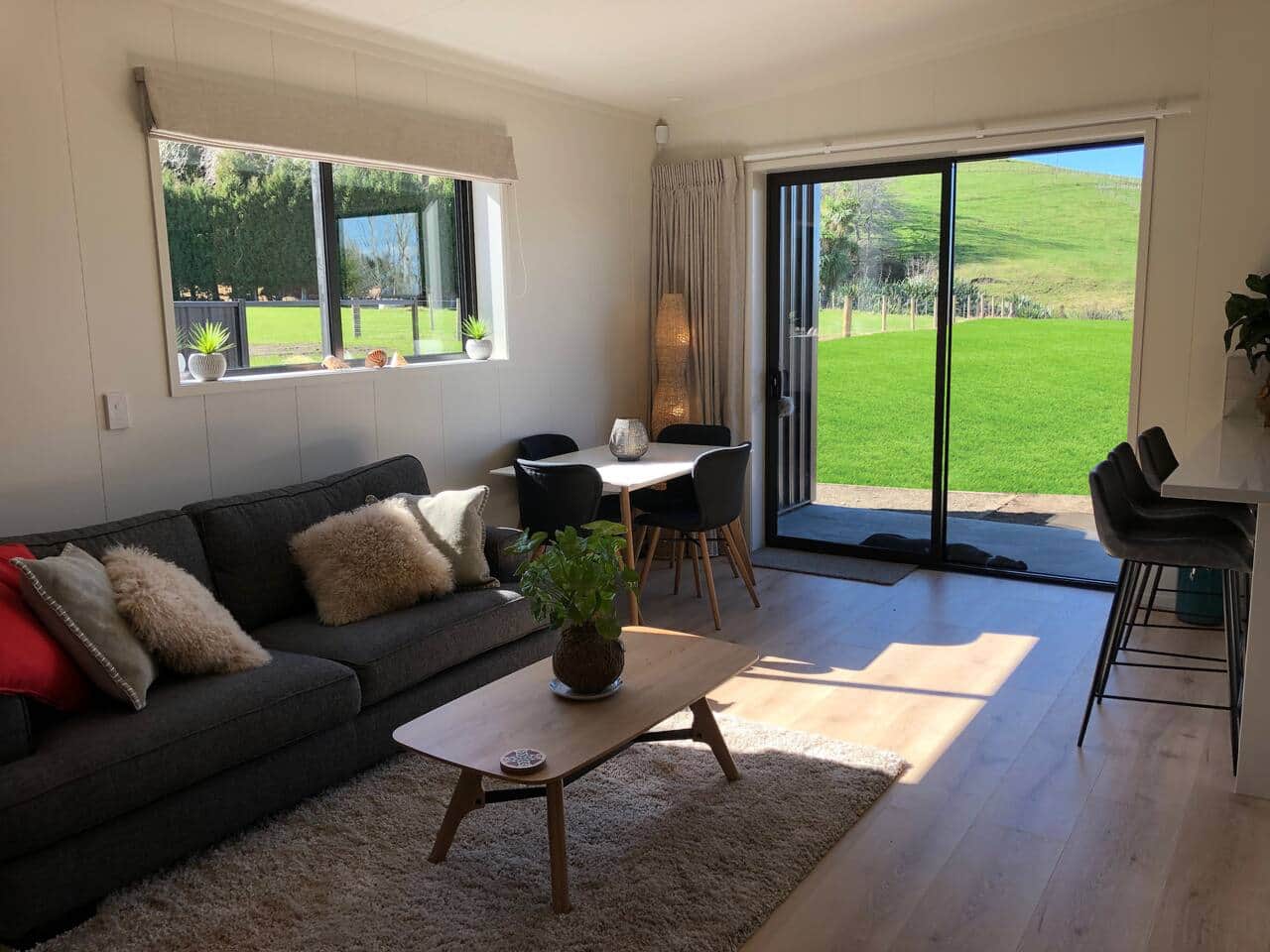 Your home away from home... light the fire, enjoy a cup of tea or glass of wine while the kids play outside .. 
check out the stars at night.. with no light pollution and just the moreporks to lull you to sleep!