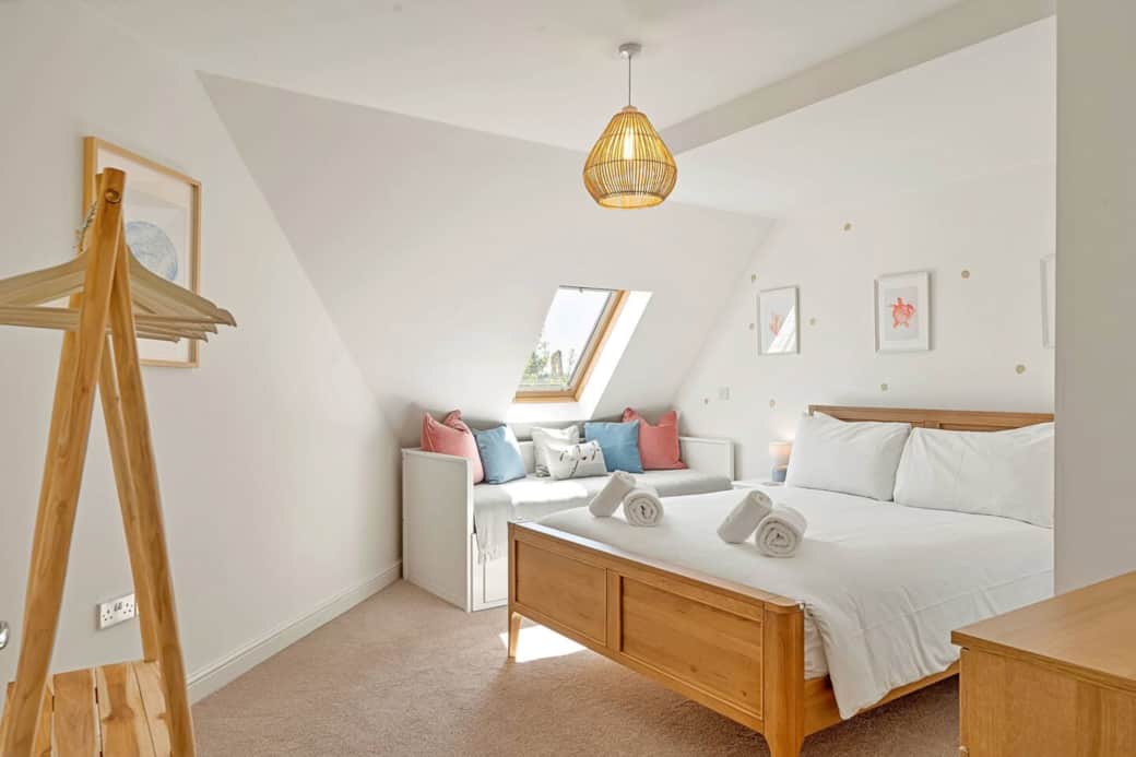 King-Sized Bedroom With Daybed in our luxury coastal penthouse