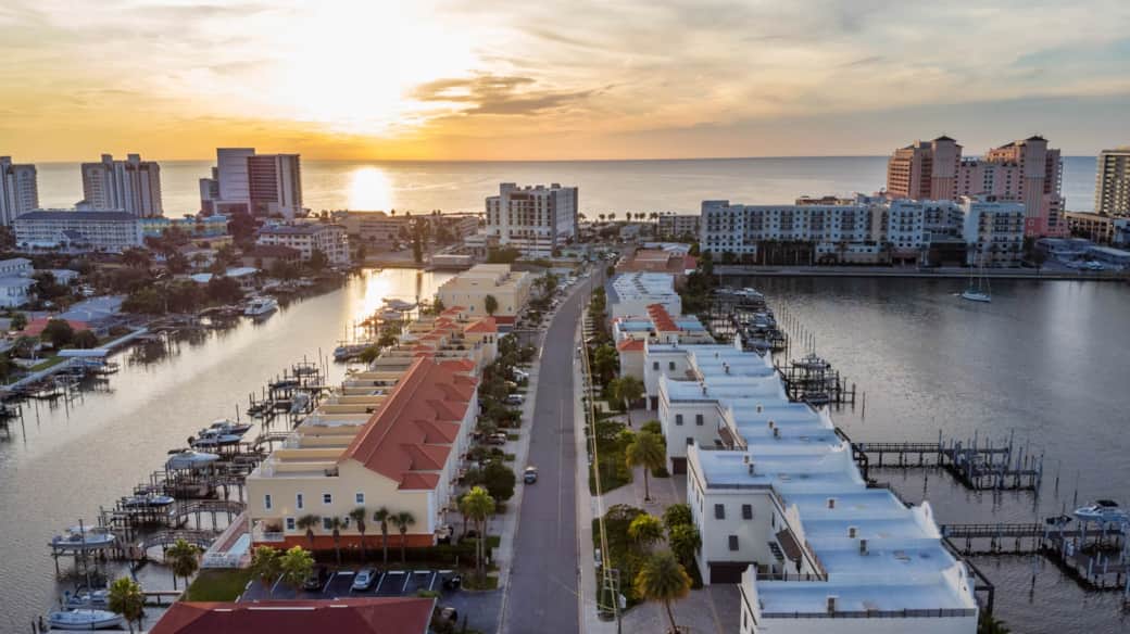 Aerial view of the home shows its location on the intracoastal and close proximity to the beach
